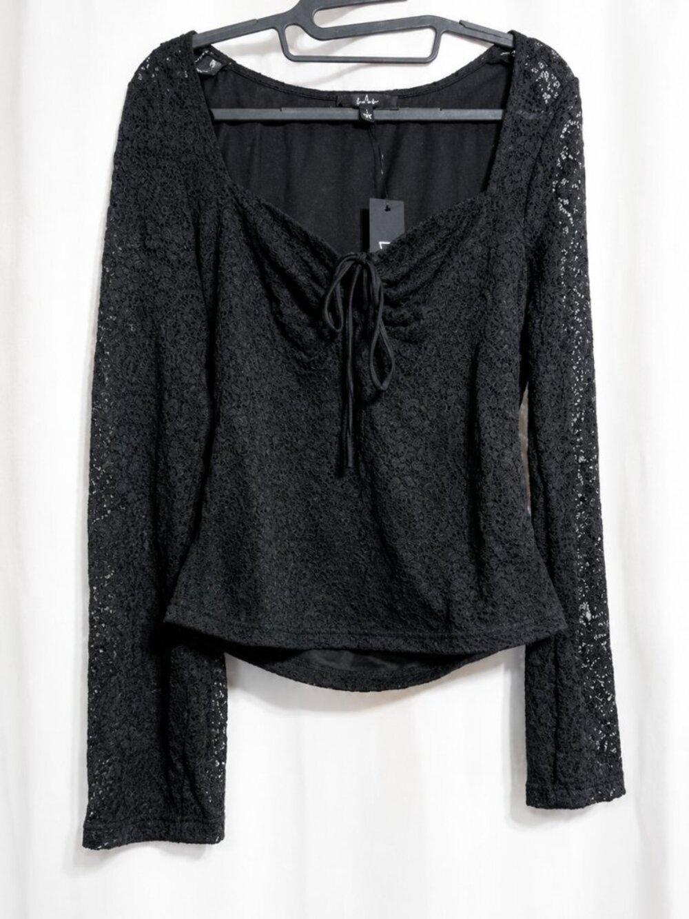 New with tags Lulus black lace long sleeve top in size L